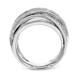 Bold and modern, this 18k white gold ring contains 1.11 ctw of baguette diamonds and .48 ctw of round diamonds set into a dynamic, overlapping design.