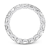 This lovely 18k white gold eternity band is a classic design with a vintage inspired twist, with 4.64 ctw of Asscher cut diamonds extending around the entirety of the ring.