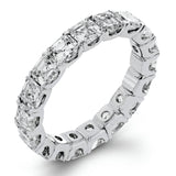 This lovely 18k white gold eternity band is a classic design with a vintage inspired twist, with 4.64 ctw of Asscher cut diamonds extending around the entirety of the ring.