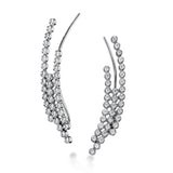 These fashionable climber earrings contain a stunning .62 ctw of white diamonds bezel set into a modern 18k gold design.