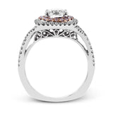This lovely halo engagement ring is crafted in tones of 18k rose and white gold and contains .36 ctw of white diamonds along with .18 ctw of pink diamonds.