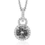 Classically elegant, this white gold pendant features a halo setting glittering with .20 ctw of round white diamond accents.