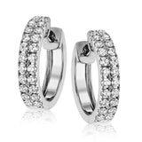 Two rows of .50 ctw of diamonds sparkle in this modern hoop earrings.
