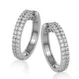 A full 1.00 ctw of round white diamonds form two rows of sparkle in these lovely 18k white gold hoop earrings.