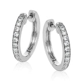 These darling 18k white gold hoop earrings contain .34 ctw of white diamonds, and are the perfect delicate size to wear everyday.