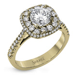 This 18k white gold engagement ring setting has a stunning double halo design set with .61 ctw of shining white round brilliant diamonds.