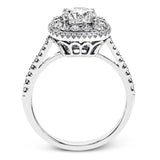This 18k white gold engagement ring setting has a stunning double halo design set with .61 ctw of shining white round brilliant diamonds.