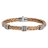 Carefully woven from 18k rose gold, this remarkable bangle bracelet is perfect for everyday wear as well as formal occasions with .72 ctw of white diamonds. Perfect for stacking.