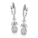 These lovely 18k white gold earrings contain .75 ctw of marquise diamonds, .30 ctw of pear shaped diamonds, .13 ctw of princess cut diamonds, and .30 ctw of round brilliant diamonds.