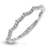This distinctive 18k white gold ring has an intricate design reminiscent of lover's knots and eternity symbols, set with .33 ctw of white diamonds.