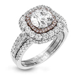 This bold design combines tones of pink and white with 1.11 ctw of sparkling white diamonds in 18k white gold complimenting .07 ctw of pink diamonds in 18k rose gold.