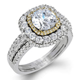 This bold design combines tones of pink and white with 1.11 ctw of sparkling white diamonds in 18k white gold complimenting .07 ctw of pink diamonds in 18k rose gold.