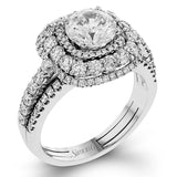 This bold design combines tones of pink and white with 1.11 ctw of sparkling white diamonds in 18k white gold complimenting .07 ctw of pink diamonds in 18k rose gold.