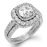 This bold design combines tones of pink and white with 1.11 ctw of sparkling white diamonds in 18k white gold complimenting .07 ctw of pink diamonds in 18k rose gold.