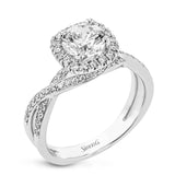 This sparkling modern engagement ring features an eye-catching twisted design with elegant classic halo accented by .29 ctw of shimmering round cut white diamonds.