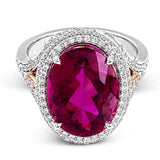 A beautiful 7.55 ct oval rubellite sits at the center of this enchanting 18k white gold ring with accents of 18k rose gold. A beautiful .70 ctw of white diamonds finishes this lovely design.
