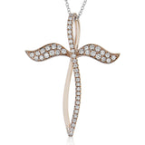 This cross pendant seems almost to be growing wings to fly away in this unique 18k white gold design set with .43 ctw of white diamonds.