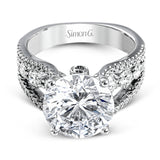 This amazing 18k white gold engagement ring contains 1.66 ctw of white round brilliant diamonds in a modern yet classic design.