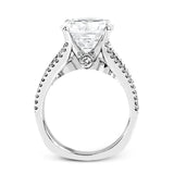 This amazing 18k white gold engagement ring contains 1.66 ctw of white round brilliant diamonds in a modern yet classic design.