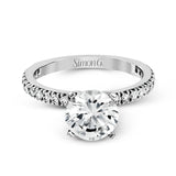 This beautiful 18k white gold wedding set contains a stunning .75 ctw of white round brilliant diamonds.