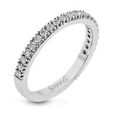 This beautiful 18k white gold wedding set contains a stunning .75 ctw of white round brilliant diamonds.