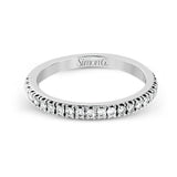 This beautiful 18k white gold wedding set contains a stunning .75 ctw of white round brilliant diamonds.