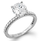 This beautiful 18k white gold wedding set contains a stunning .75 ctw of white round brilliant diamonds.