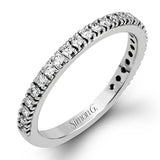 This beautiful 18k white gold wedding set contains a stunning .75 ctw of white round brilliant diamonds.