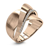 18k rose and white gold combine in this modern, overlapping band, accented by .12 ctw of white round brilliant diamonds.