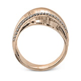18k rose and white gold combine in this modern, overlapping band, accented by .12 ctw of white round brilliant diamonds.