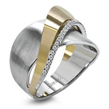 18k rose and white gold combine in this modern, overlapping band, accented by .12 ctw of white round brilliant diamonds.