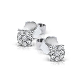 These 18k white gold stud earrings are a classic choice with a grouping of .26 ctw of round diamonds encircling .30 ctw round center diamonds.