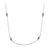 This delicate white gold chain is complemented by .06 ctw of white diamond accents.
