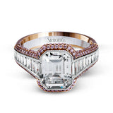 This 18k white and rose gold ring has a clean, graduated design with .84 ctw of baguette diamonds leading up to the center stone. The edges are bordered by .49 ctw of pink diamonds set into rose gold.