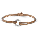 This wonderful 18k gold bracelet would be perfect for everyday wear with .39 ctw of white diamonds set into a circular buckle design.