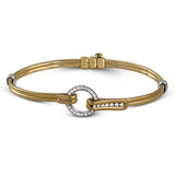 This wonderful 18k gold bracelet would be perfect for everyday wear with .39 ctw of white diamonds set into a circular buckle design.