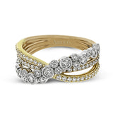 This modern tri-tone 18k gold ring features an overlapping design containing .73 ctw of shining white round brilliant diamonds.