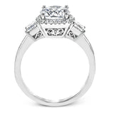 The impressive circular halo of this white gold engagement ring is set with .10 ctw round cut white diamonds and emphasized by .43 ctw princess cut diamonds and .58 baguette cut diamonds.