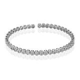 This lovely 18k white gold bracelet is formed by charming flowers made from an amazing 1.30 ctw of white diamonds.  Perfect for stacking.