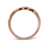Two delicately leafed branches form the stage for this contemporary rose gold ring, accented with .21 ctw of brilliant white diamonds.