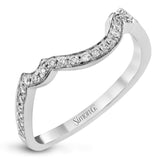 Dramatic yet romantic, this exquisite white gold engagement ring features .61 ctw of round cut white diamonds highlighted by .58 ctw of pear shaped diamonds in delicate floral motifs.