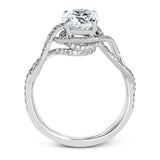 Classic with a modern twist, this white gold engagement ring features .50 ctw of sparkling white diamonds in a dramatic openwork design.