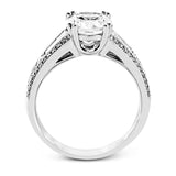 The charming design of this white gold contemporary ring is accented by .36 ctw baguette cut diamonds and .33 ctw round cut white diamonds.