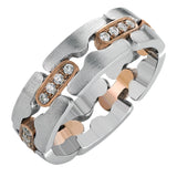 This dramatic puzzle-piece white gold band is highlighted by rose gold accents inset with .35 ctw of brilliant round cut white diamonds.