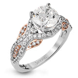 Presenting a dramatic contemporary design, this two-tone engagement ring is highlighted with .42 ctw of sparkling white diamonds.