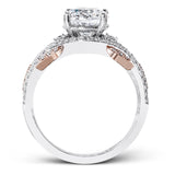 Presenting a dramatic contemporary design, this two-tone engagement ring is highlighted with .42 ctw of sparkling white diamonds.