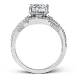 Presenting a dramatic contemporary design, this two-tone engagement ring is highlighted with .42 ctw of sparkling white diamonds.