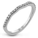 Presenting a dramatic contemporary design, this two-tone engagement ring is highlighted with .42 ctw of sparkling white diamonds.