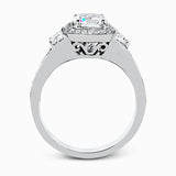 Featuring a lovely contemporary design, this white gold ring is complemented by a halo of .28 ctw round cut white diamonds and accented with .44 ctw moon shaped diamonds.