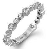 This wonderful stacking band can be worn with others or on its own. It has .30 ctw of multi-sized round white diamonds.